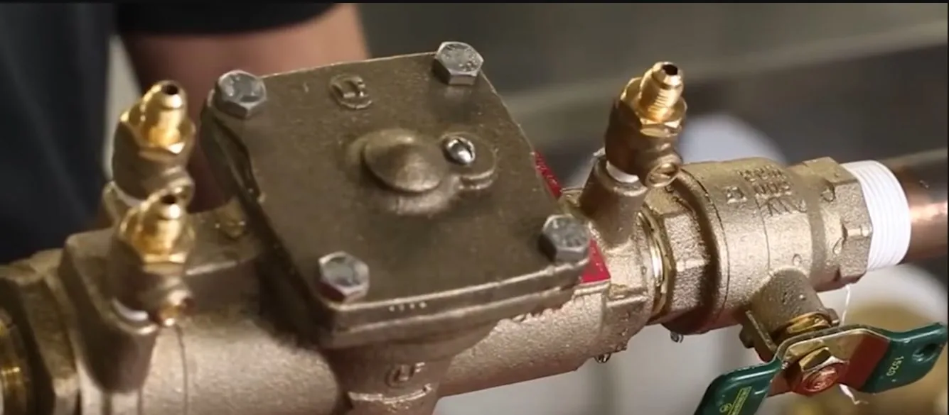 Commercial backflow valve installed on a building supply line