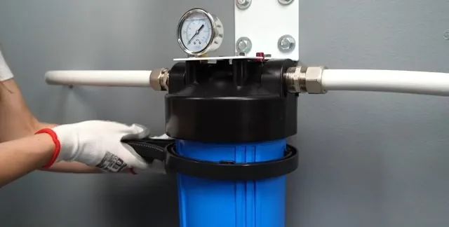 Completed whole-house filtration system with its pressure gauge installed