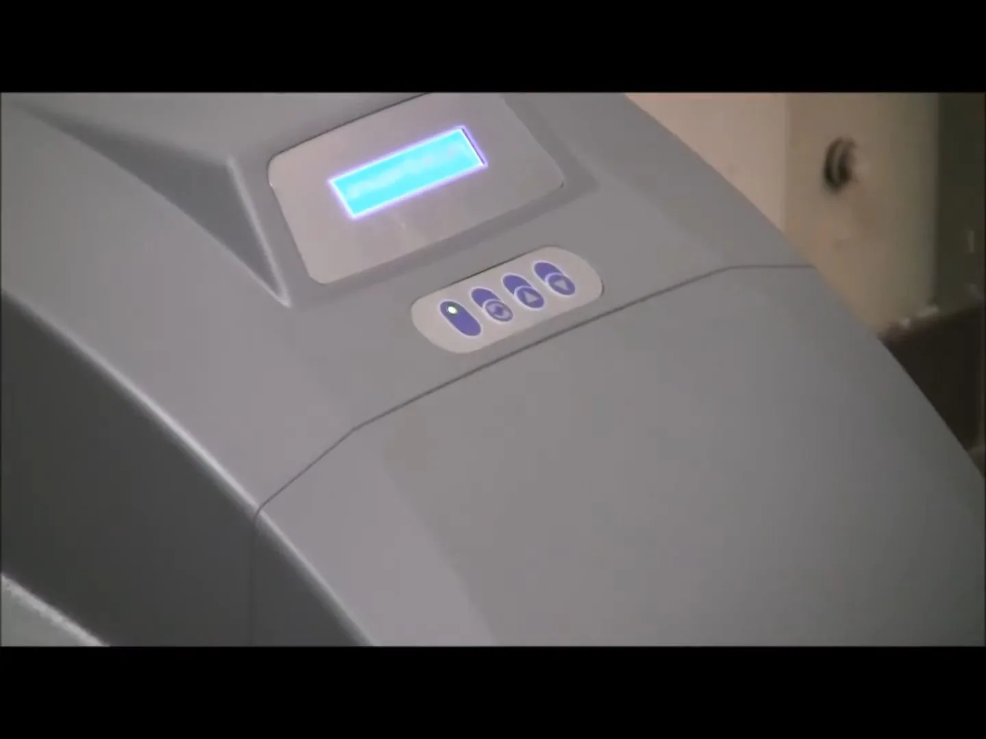 Digital control panel on a modern water softener unit