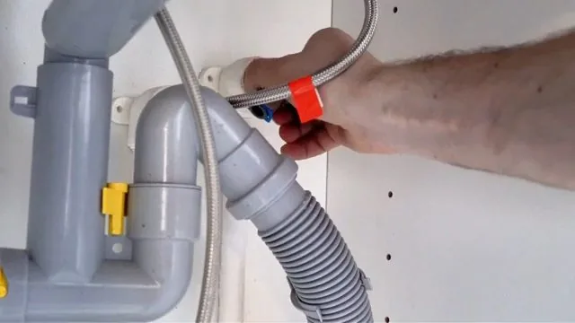 Supply and drain lines being disconnected ahead of a faucet swap