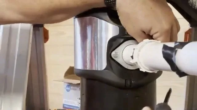 Mounting ring being locked into place on a garbage disposal