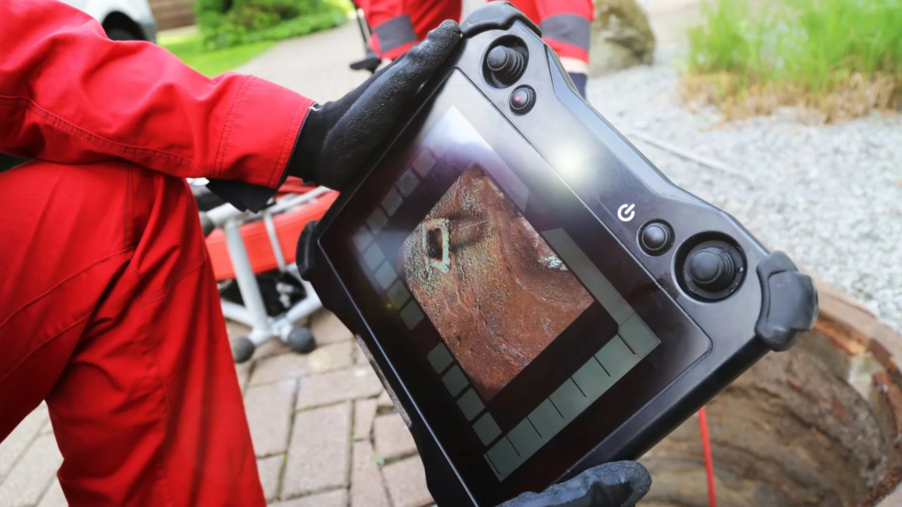 Pipe camera moving through a sewer line during inspection