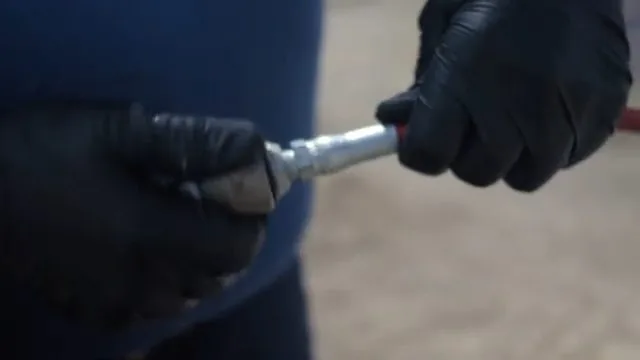 Technician selecting the right hydro jet nozzle from a tool case