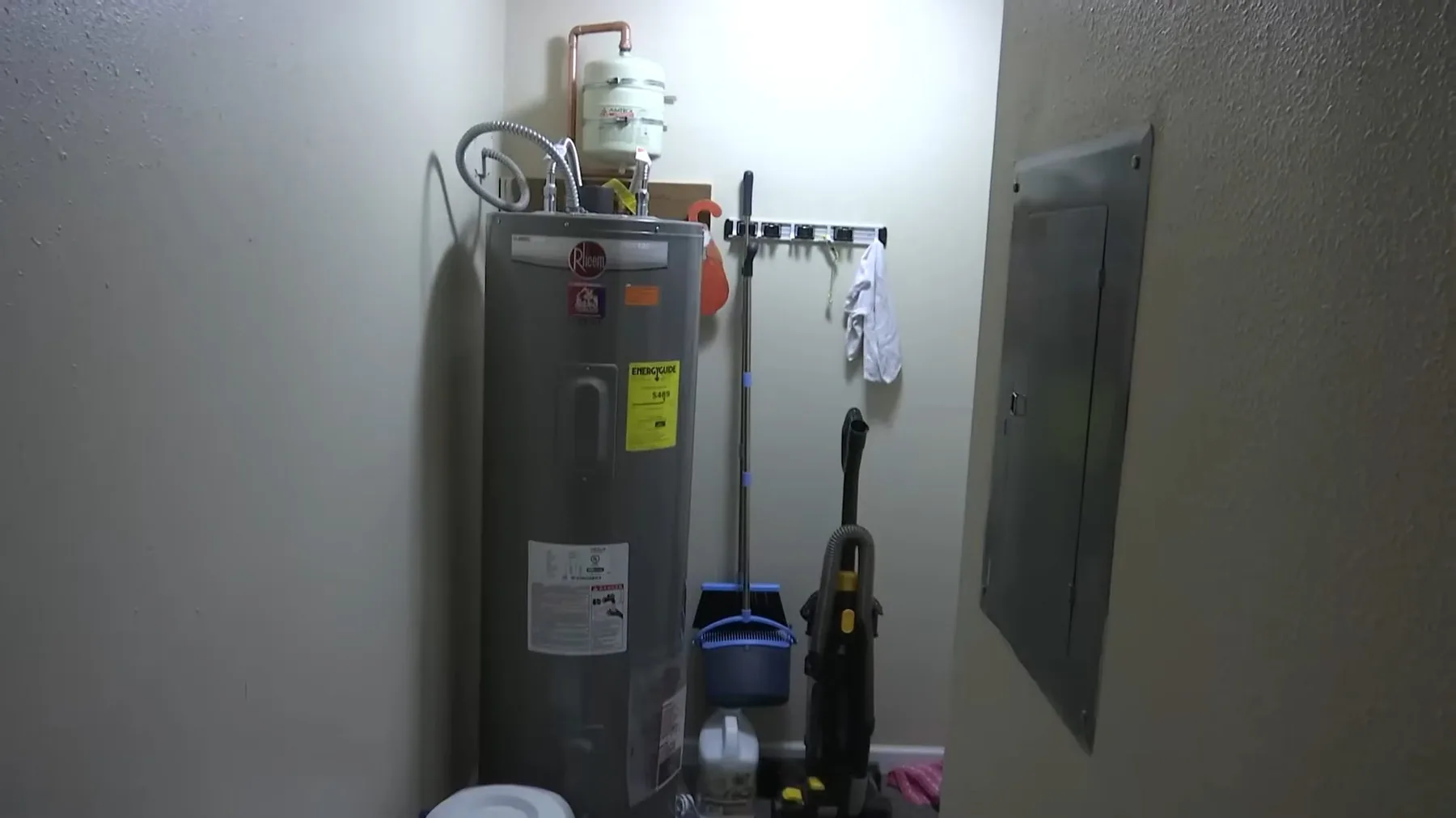 Water heater installed inside a small residential utility room